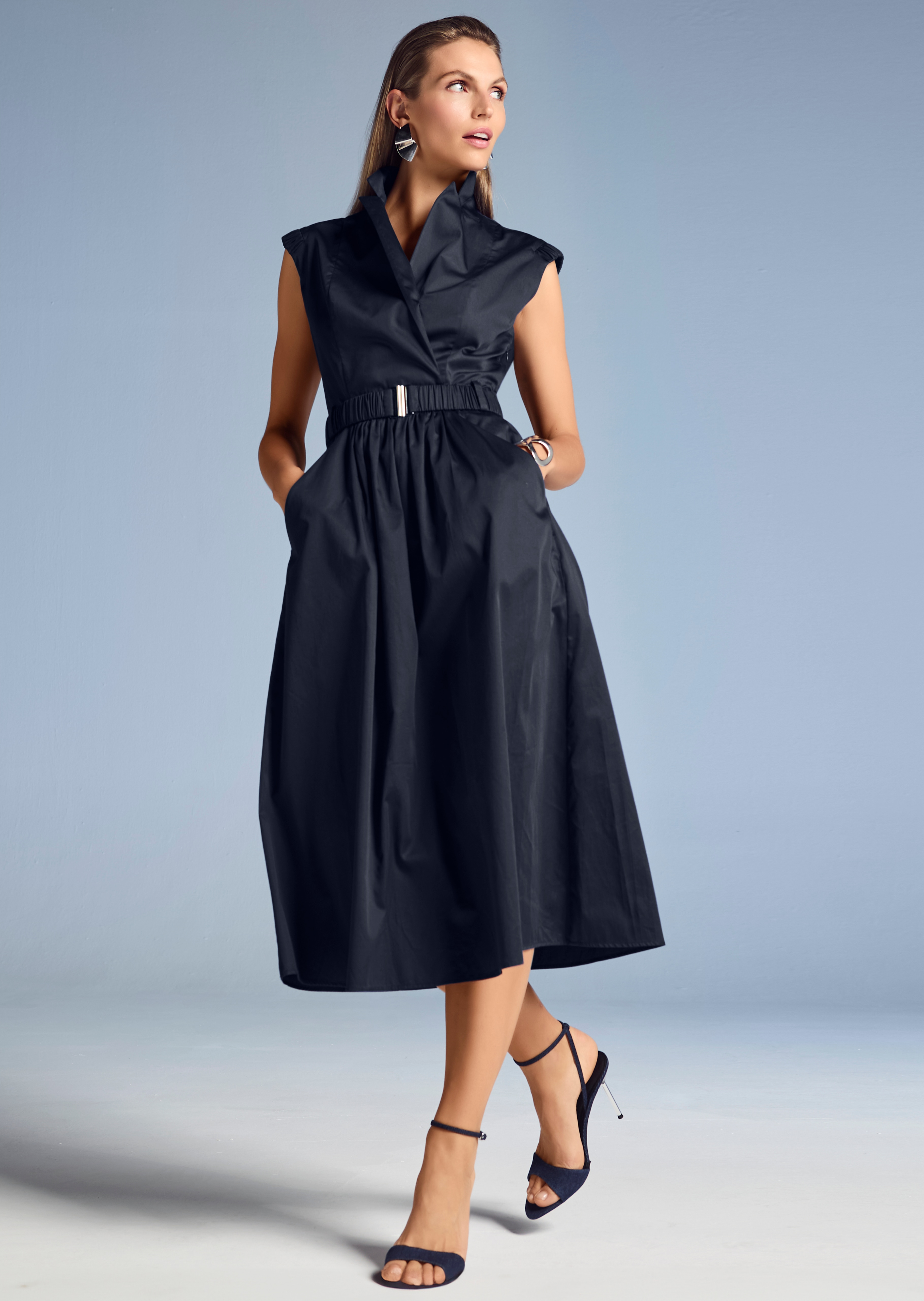 Mouwloze zomerjurk met rimpeldetails