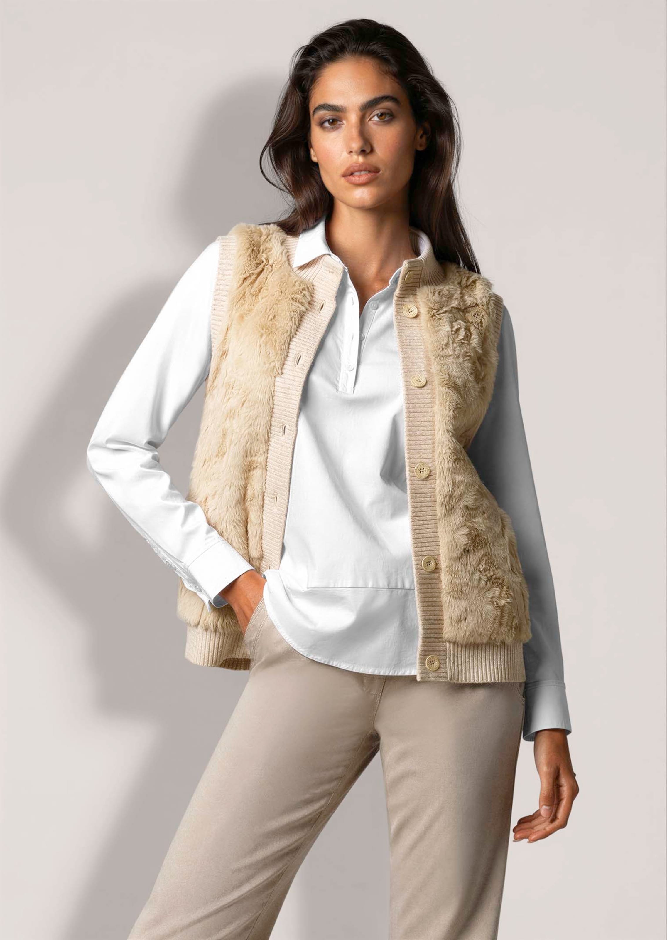 Faux fur waistcoat with a stand-up collar