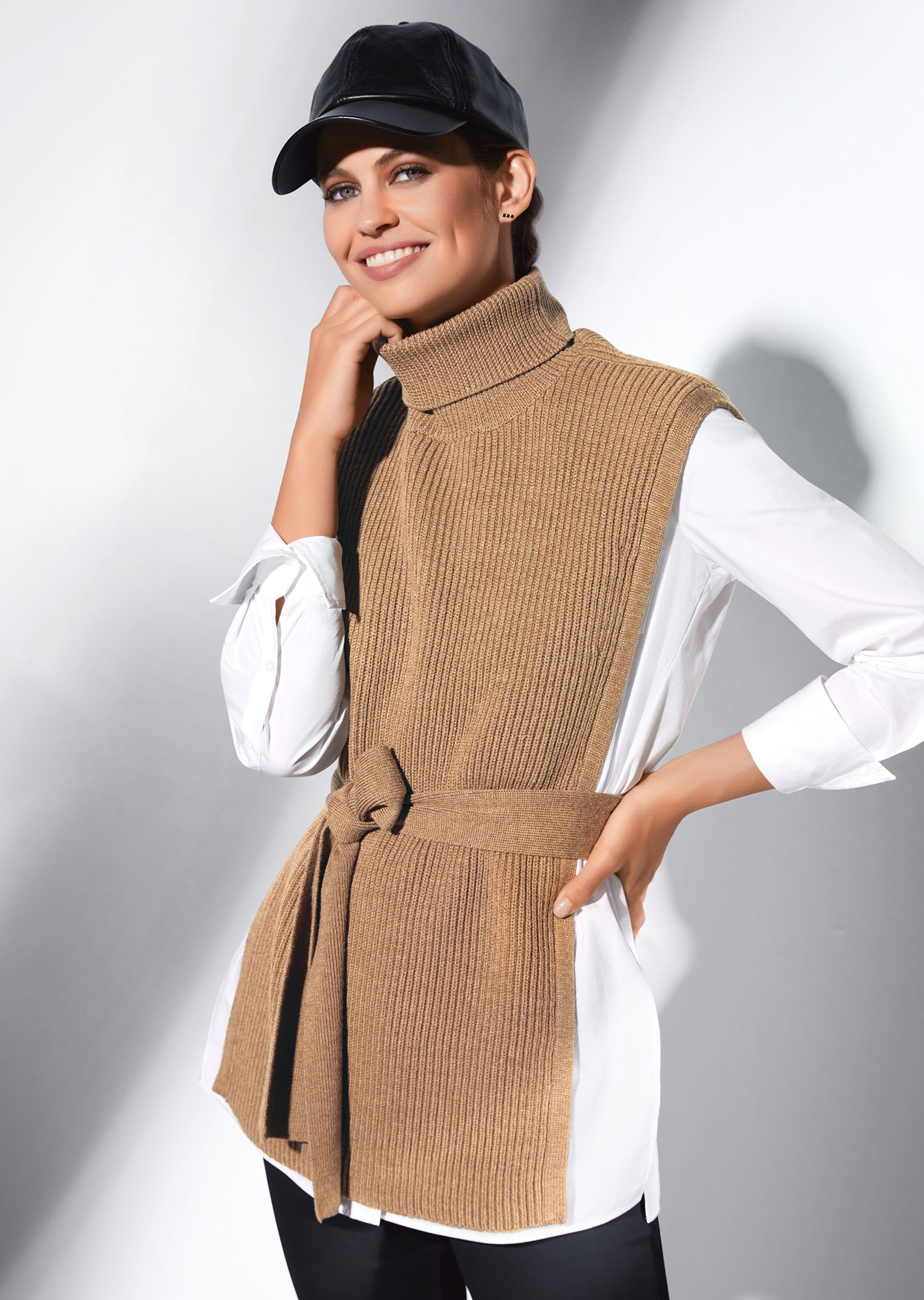 Knitted jumper with turtleneck and tie ribbon
