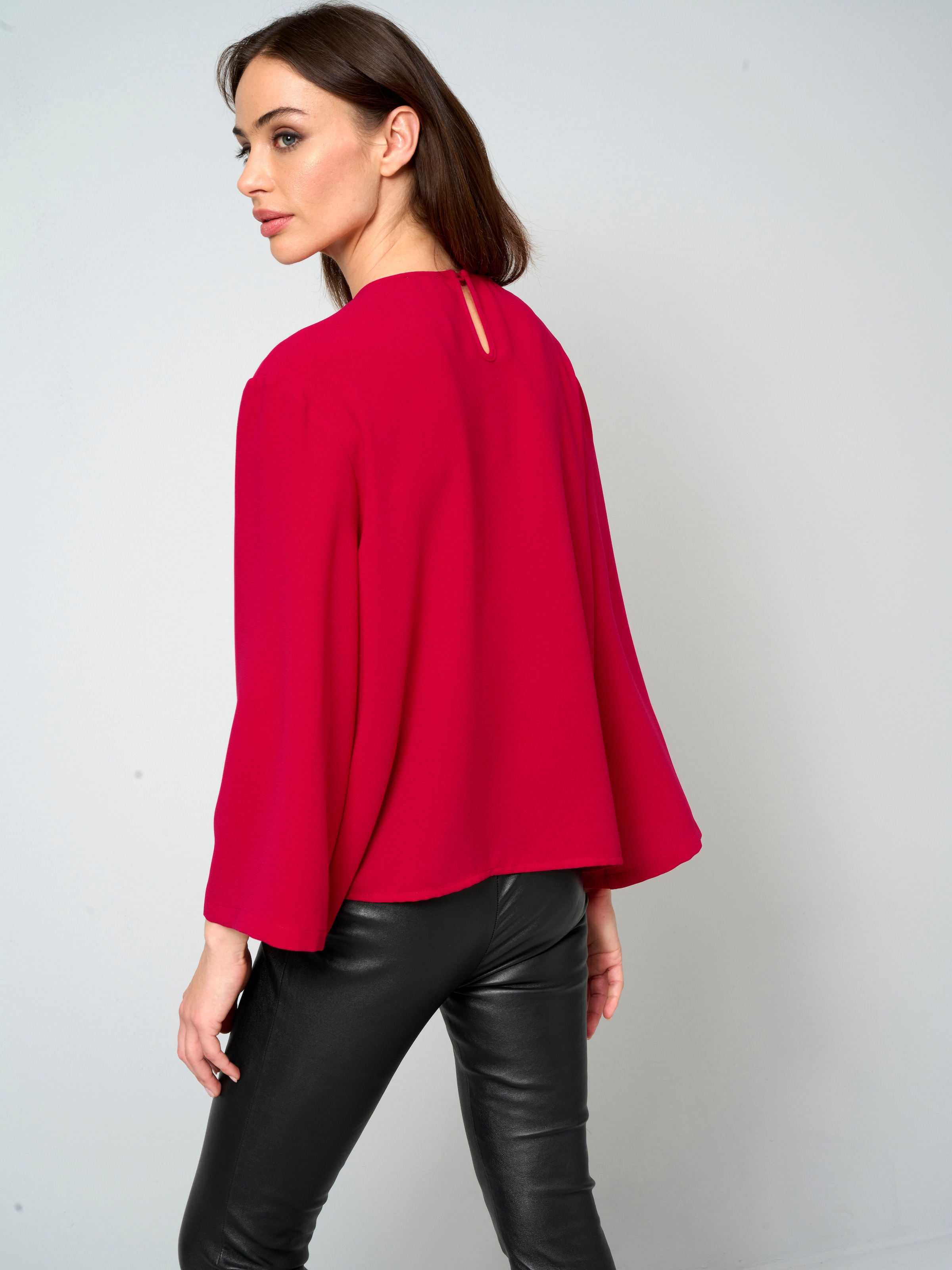 Bluse mit Perlenmotiv 2