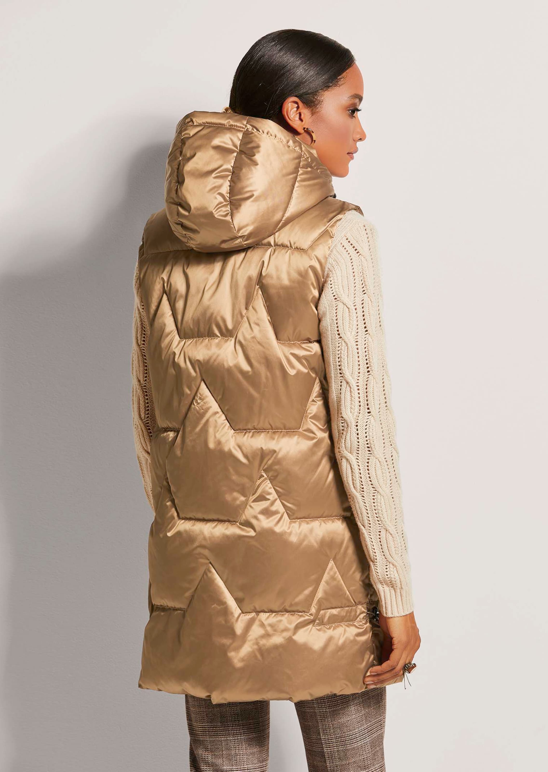 Braune wattierte outlets Weste/Parka