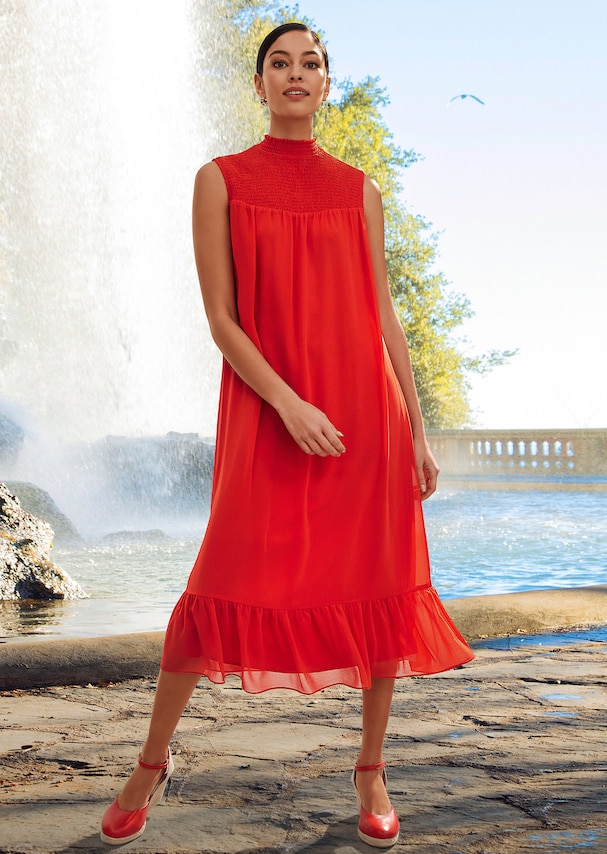 Sleeveless chiffon dress with elegant print