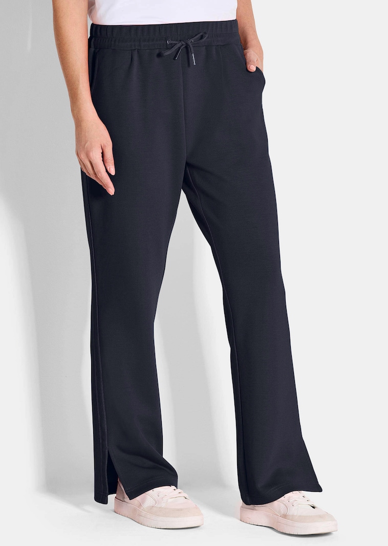 Pantalon de sport avec bandes à effet visuel allongeant sur les côtés