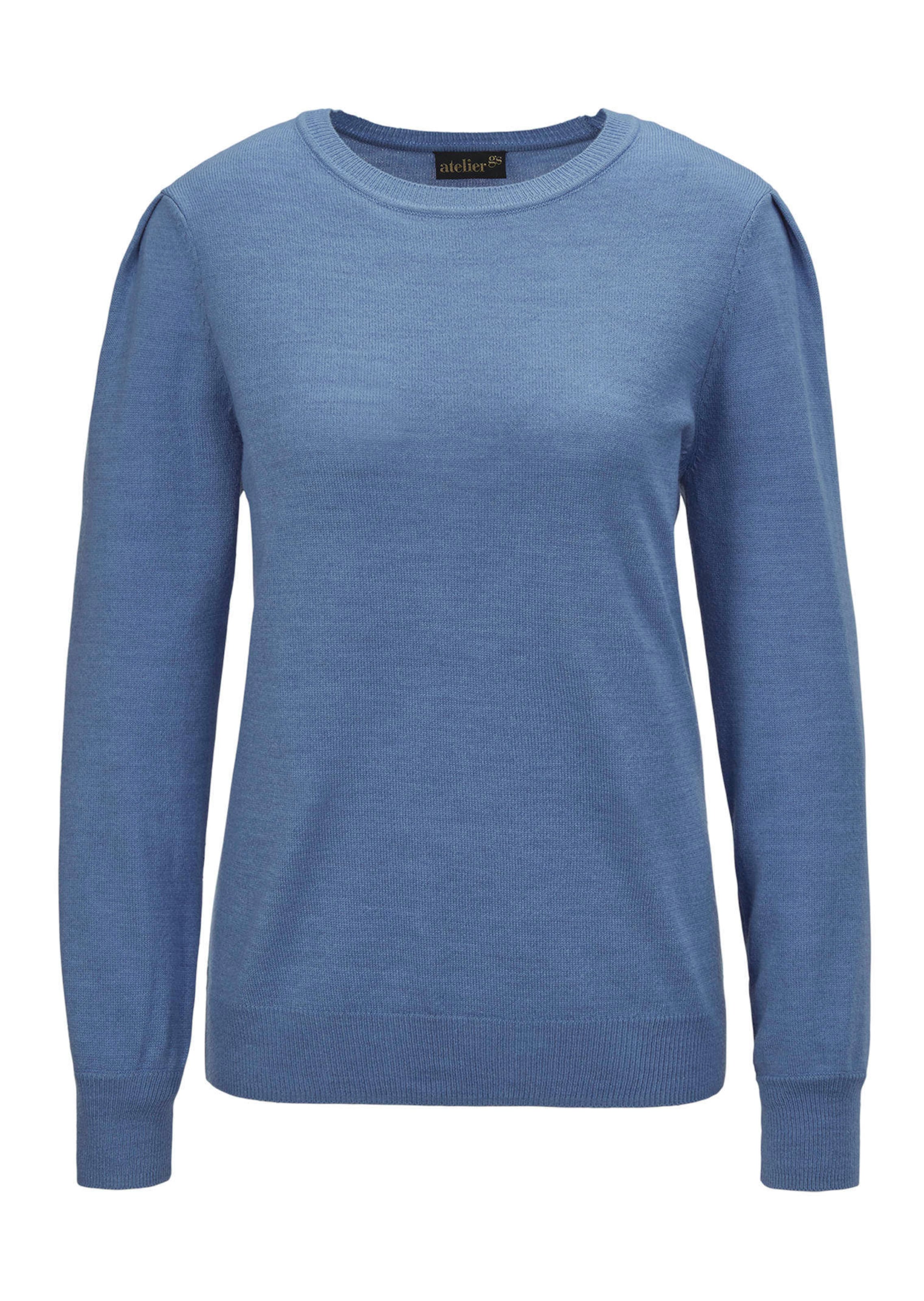 Pehmeä neulepusero modernein pallohihoin