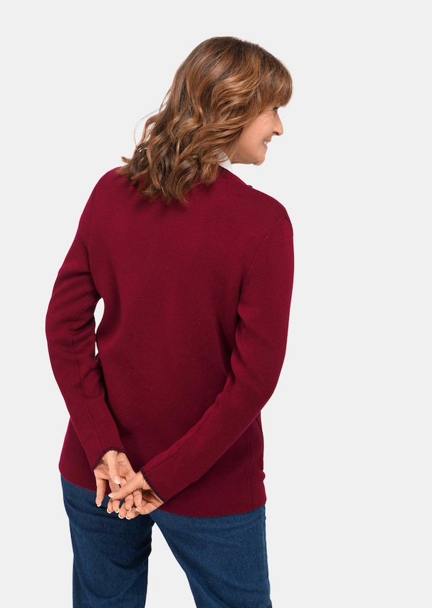 Lang tricot jasje met contrastkleurige sierranden 1