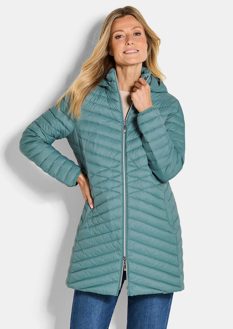 Daunenmantel mit femininer Steppung