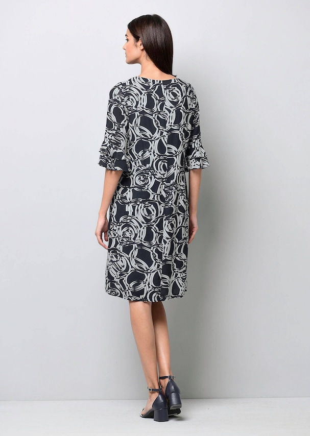 Kleid mit grafischem Dessin 1
