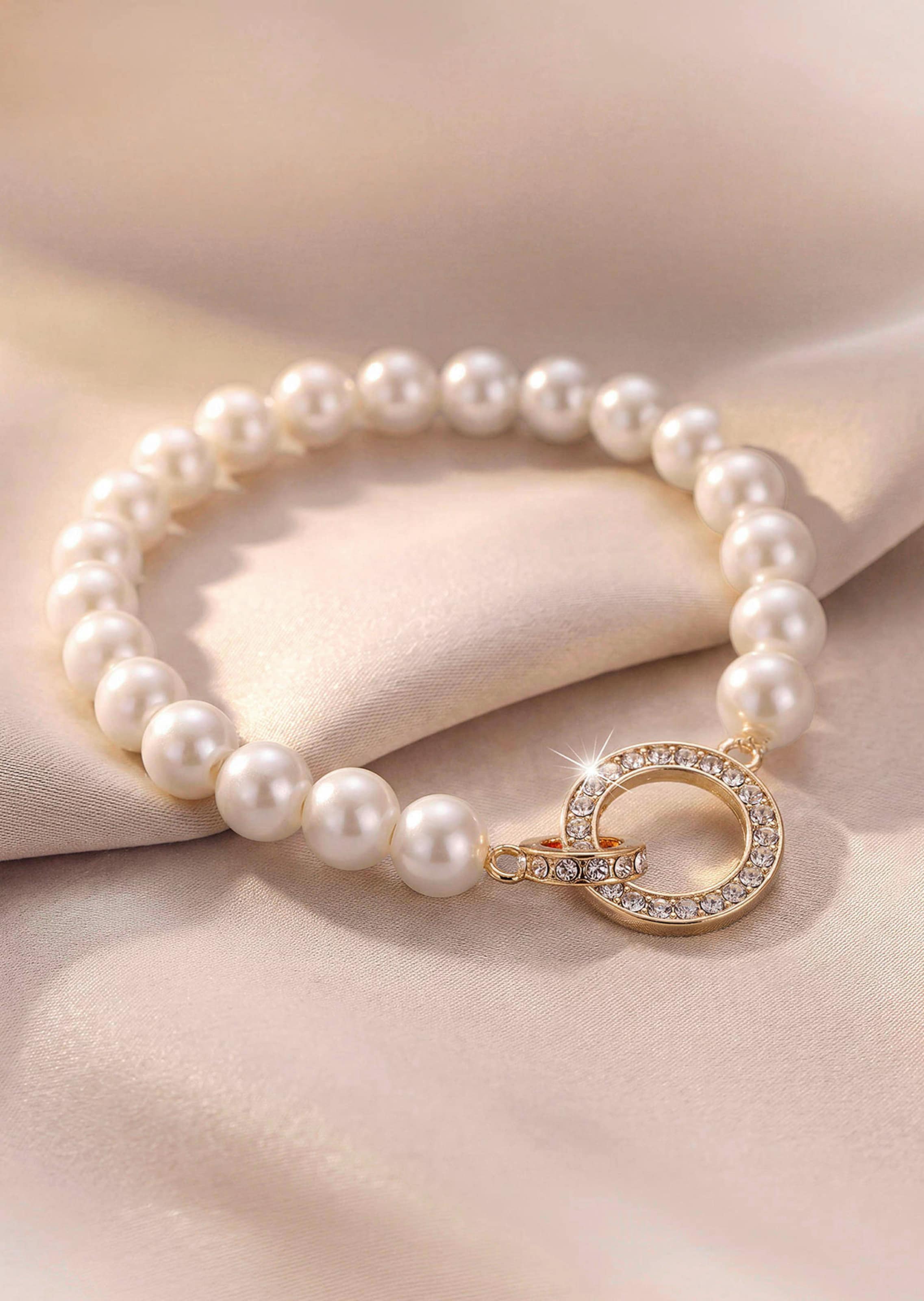 Sieradenset bestaande uit een ketting en oorknopjes - gebroken wit / zilverkleurig - Gr. Standaardmaat van Goldner Fashion