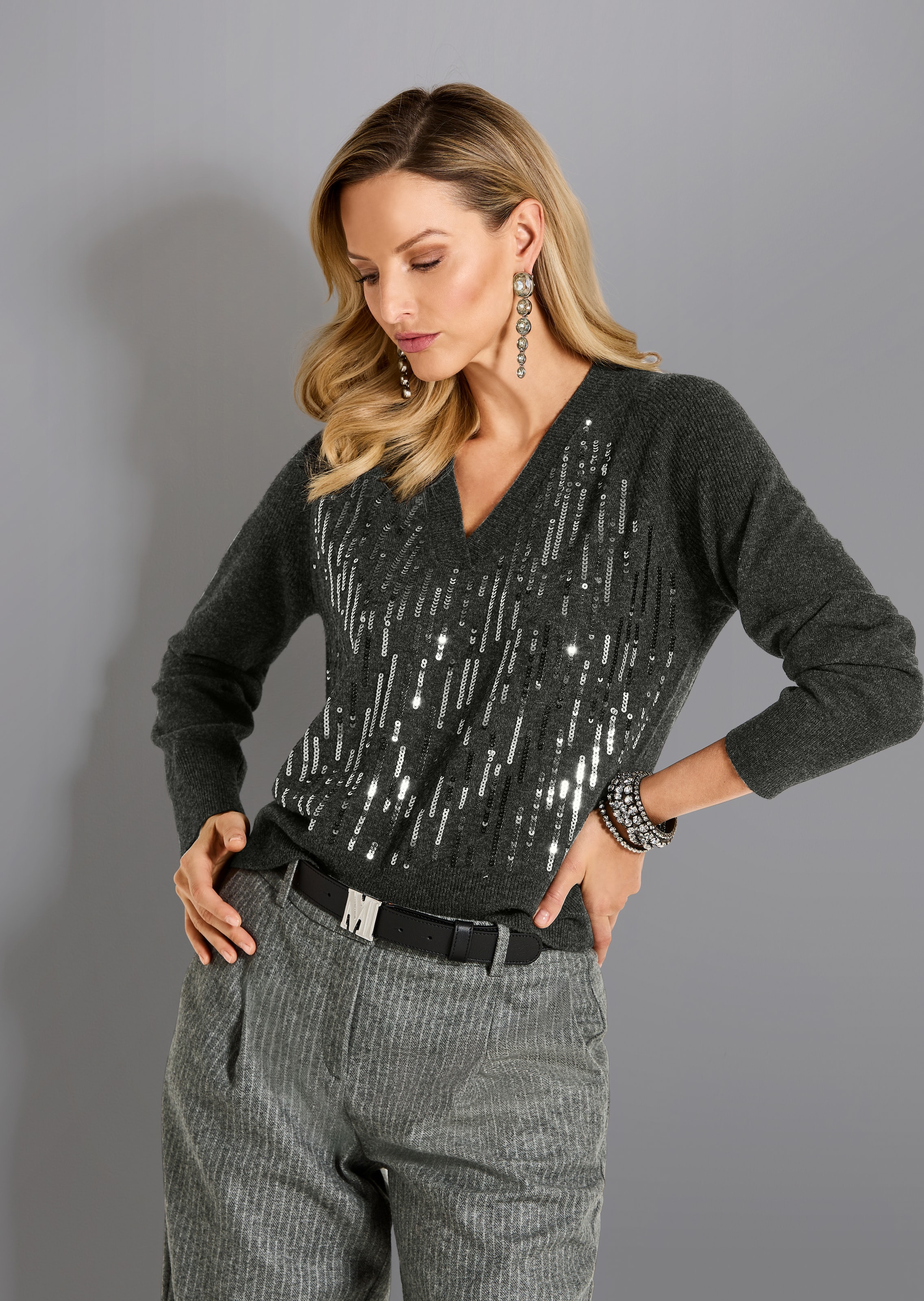Schurwoll-Pullover mit Pailletten