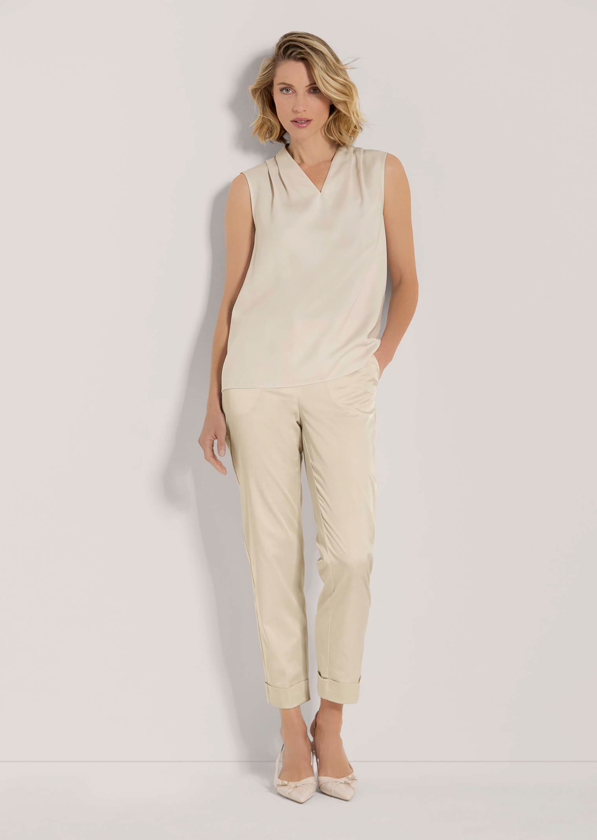 Top in pearl white | MADELEINE Fashion