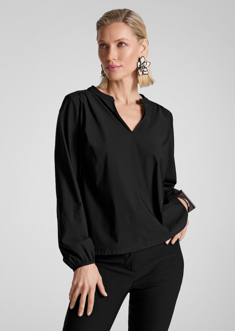Jersey-Bluse mit raffiniertem Ausschnitt