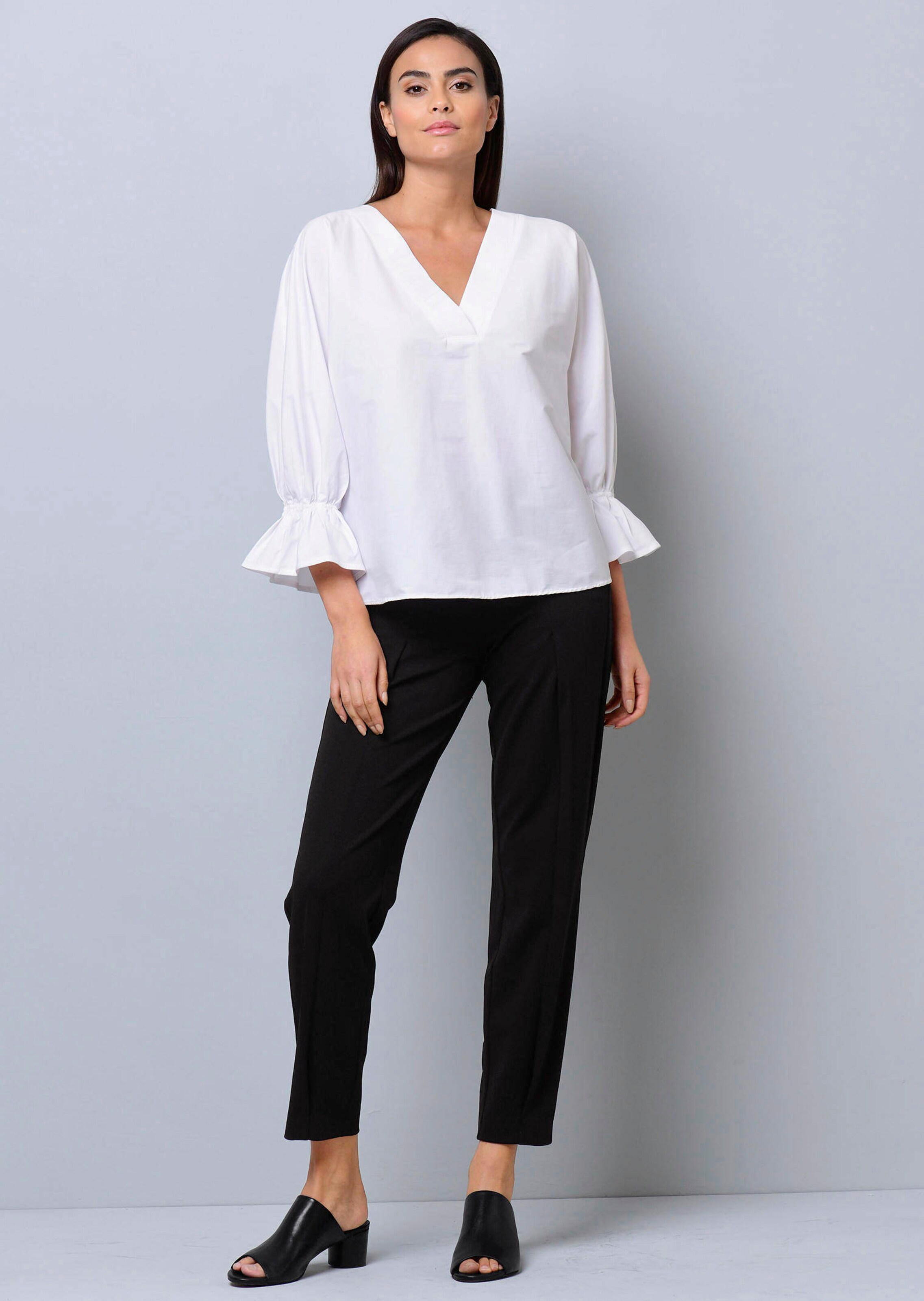 Oversizedbluse mit Volant am Ärmelabschluss