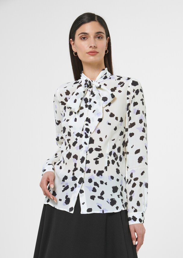 Flared blouse with unique print
