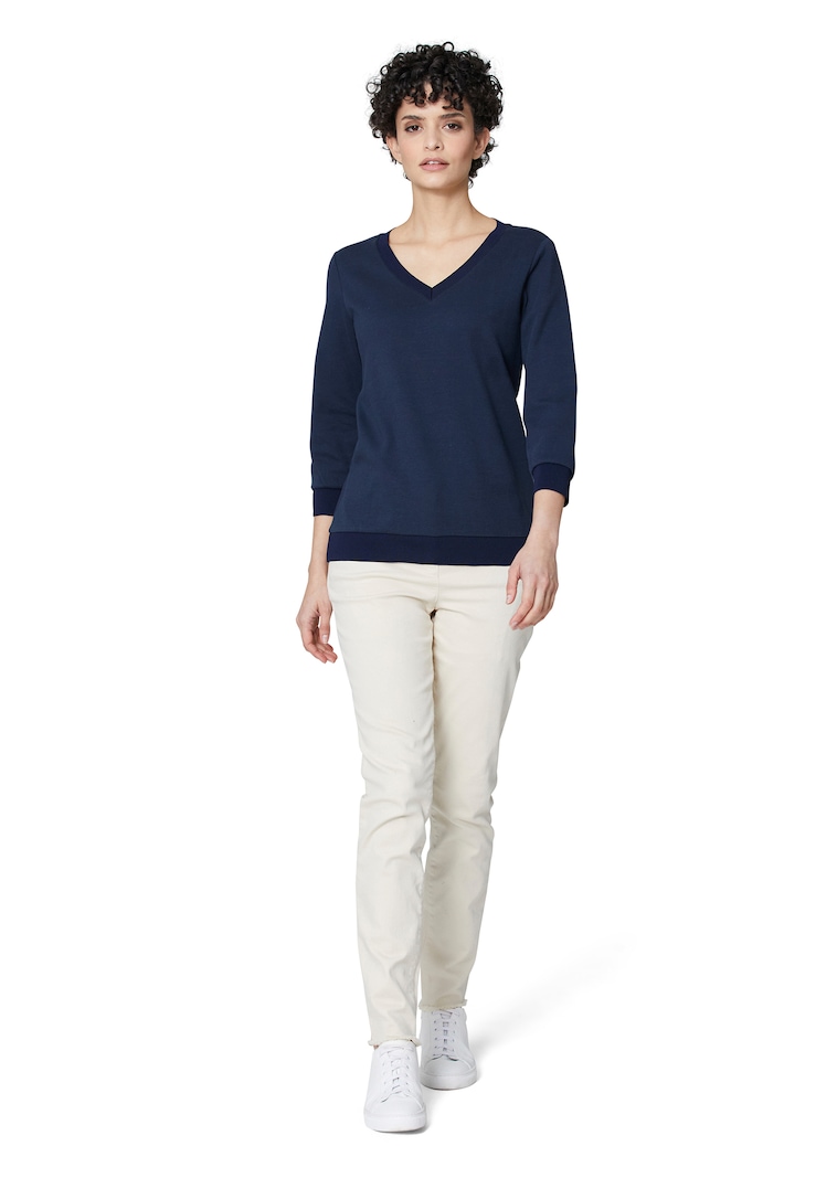 Sweatshirt mit 3/4-langen Ärmeln.