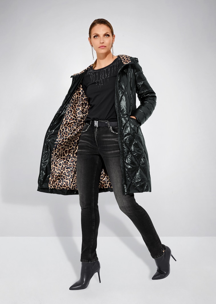 Hooded quilted jacket with leopard print lining