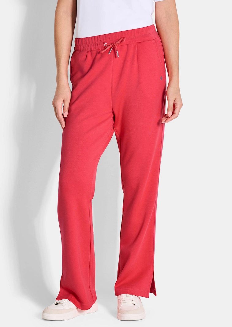 Pantalon de sport avec bandes à effet visuel allongeant sur les côtés