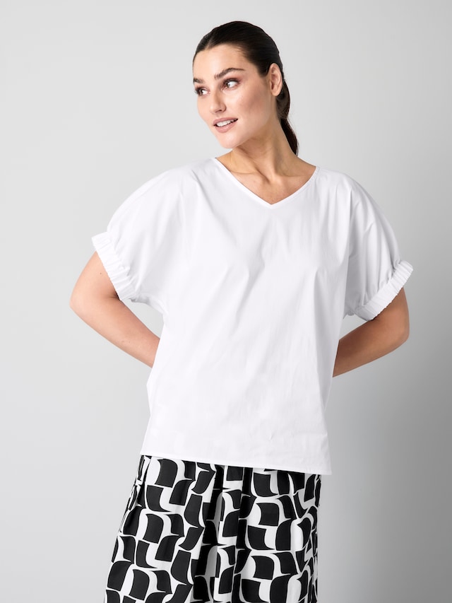Bluse mit breitem Bündchen am Ärmel