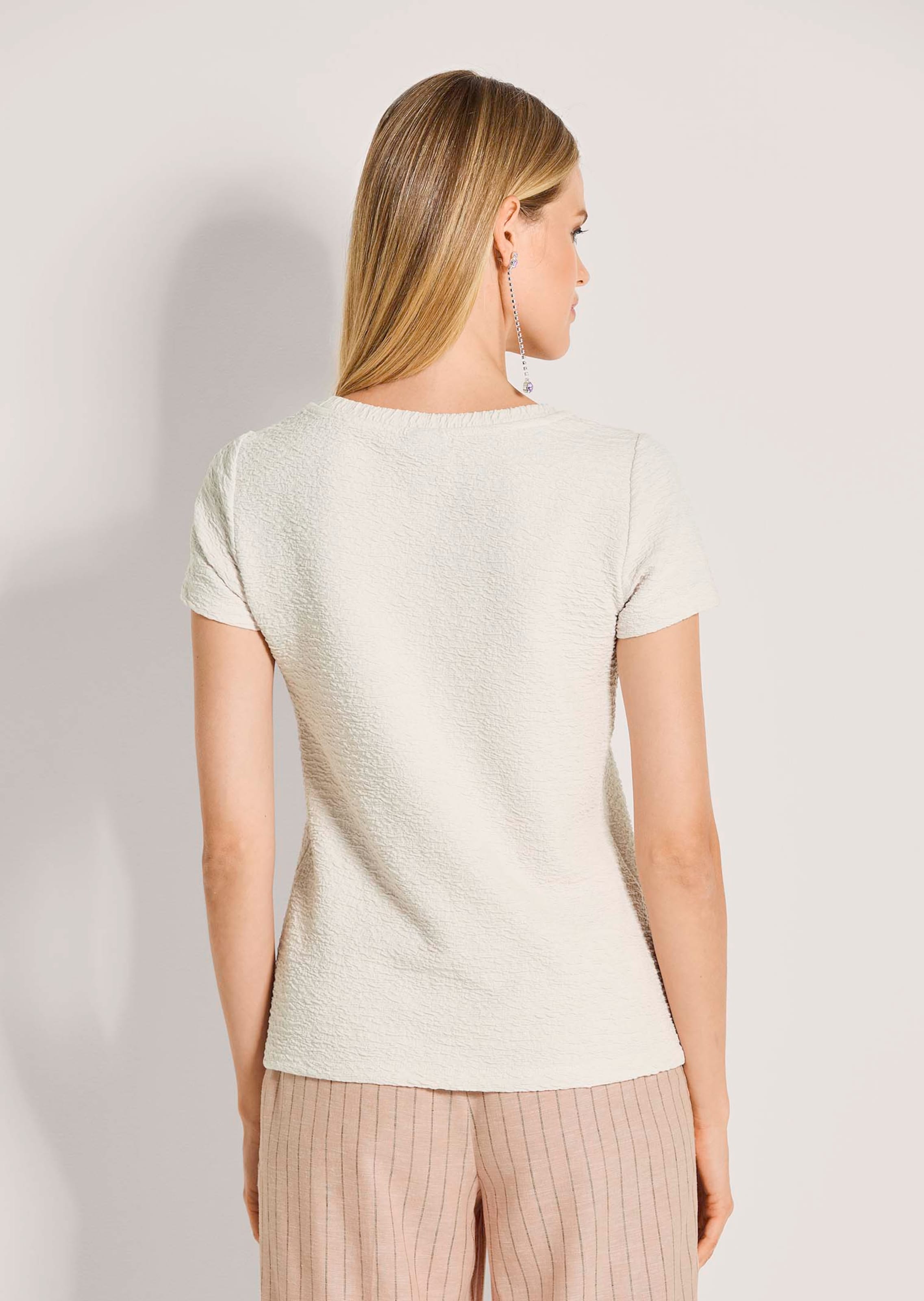 Top in pearl white | MADELEINE Fashion