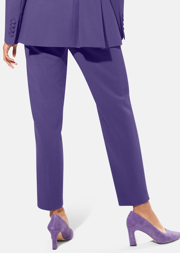 Trousers with creases and hem slits 2