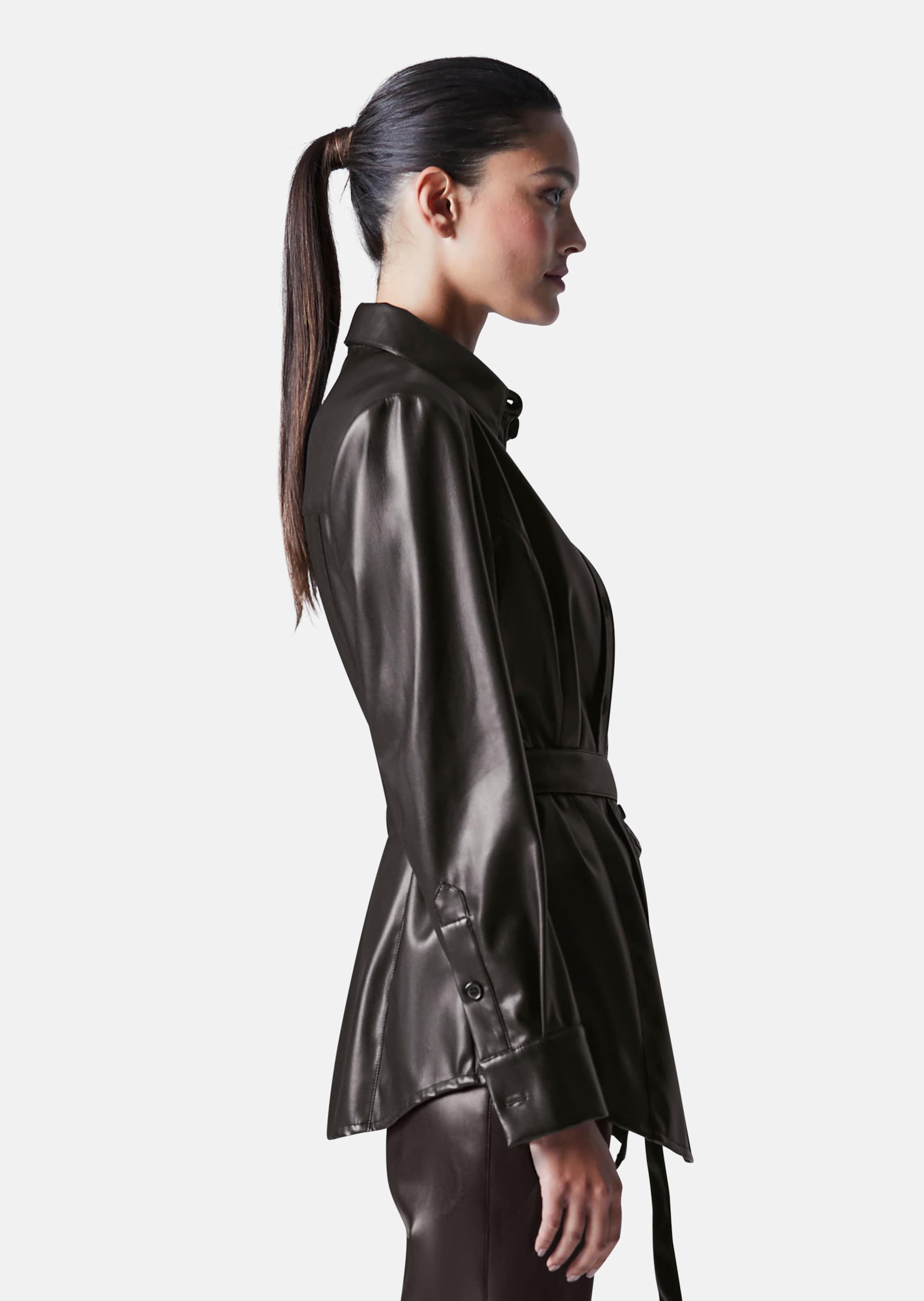 Faux leather shirt jacket in black | MADELEINE Fashion